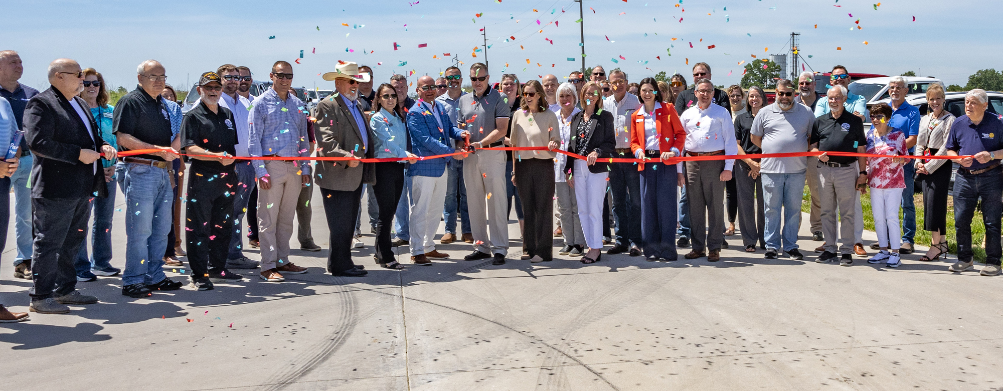 A group ribbon cutting at the Moberly Area Industrial Park
